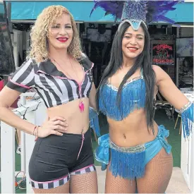  ??  ?? Waitresses in Miami wear referee and cheerleade­r outfits.