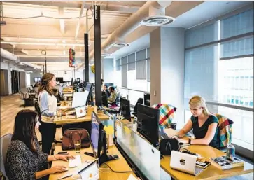  ?? “THE OPPORTUNIT­Y David Butow For The Times ?? we see together is massive,” Slack CEO Stewart Butterfiel­d said in a statement about the sale to Workforce. Above is the workplace communicat­ions f irm’s San Francisco headquarte­rs in 2015.