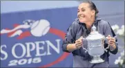  ?? Picture: DANIEL MURPHY, EPA ?? CAN YOU BELIEVE THIS? A thrilled Flavia Pennetta holds the US Open trophy.