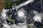  ?? NOAA / NASA ?? This satellite image from 2017 shows Hurricanes Katia, Irma and Jose. Last year’s hurricane season produced 17 named storms, 10 of which were above Category 3. Six of those storms became major hurricanes.