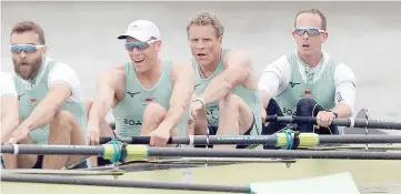  ??  ?? Cambridge’s James Cracknell (second right) in action during the men’s boat race at River Thames, London. — Reuters photo