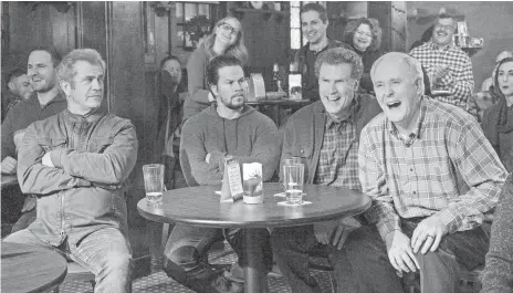  ?? PHOTOS BY CLAIRE FOLGER, PARAMOUNT ?? Kurt (Mel Gibson, left), Dusty (Mark Wahlberg), Brad (Will Ferrell) and Don (John Lithgow) take in a show in Daddy’s Home 2.
