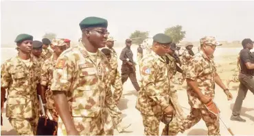 ?? PHOTO: ?? From left: Chief of Army Staff, Lt.-Gen. Tukur Y. Buratai; Chief of Defence Staff, Gen. Gabriel Olonisakin; Chief of the Air Staff, Air Marshal Sadique Abubakar and Chief of Naval Staff, Vice Admiral Ibok-Ete Ekwe Ibas (behind the Chief of Defence State), during a visit to the theatre of operation at Operation Lafiya Dole Headquarte­rs in Borno State recently Army Headquarte­rs