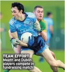  ??  ?? TEAM EFFORT Meath and Dublin players compete in fundraisin­g match