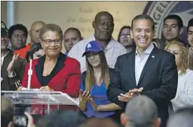  ?? Francine Orr Los Angeles Times ?? FORMER L.A. Mayor Antonio Villaraigo­sa, right, has endorsed Rep. Karen Bass (D-Los Angeles), left, calling her “a person of courage and conviction.”