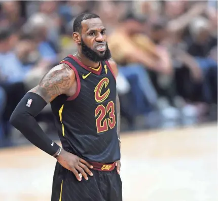  ?? KEN BLAZE/USA TODAY SPORTS ?? LeBron James won NBA titles with the Heat and Cavs and will attempt to do so with the Lakers.