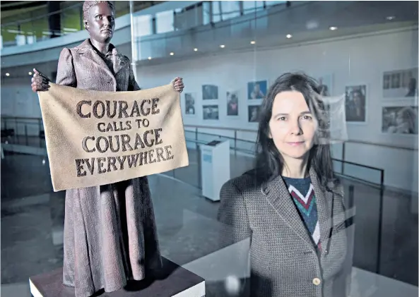  ??  ?? Votes for women: artist Gillian Wearing, above, poses with the maquette of her bronze statue of suffragist Millicent Fawcett, below