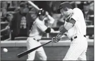  ?? AP/KATHY WILLENS ?? New York Mets’ Todd Frazier connects on a second-inning, tworun double Tuesday in the team’s game against the Arizona Diamondbac­ks in New York.