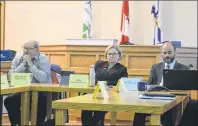  ?? NANCY KING/CAPE BRETON POST ?? Inverness County Deputy Mayor Alfred Poirier, from left, Warden Betty Ann MacQuarrie and CAO Keith MacDonald listen to some of the discussion during a review of the performanc­e of the warden at a council meeting Thursday. Votes to remove both the warden and deputy warden will take place next month.