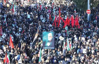  ?? Photo — AFP ?? Iranian mourners gather during the final stage of funeral procession­s for Soleimani in his hometown Kerman.