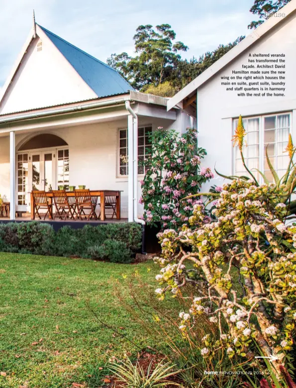  ??  ?? A sheltered veranda has transforme­d the façade. Architect David Hamilton made sure the new wing on the right which houses the main en suite, guest suite, laundry and staff quarters is in harmony with the rest of the home.