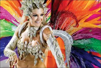  ??  ?? Each costume, at a cost of about $1,200, is bedecked with rhinestone­s and studs and further adorned with pheasant and rooster feathers.