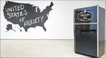  ?? Christophe­r Knight Los Angeles Times ?? SCOTT GRIEGER’S “United States of Anxiety” and John Boskovich’s “Prada Refrigerat­or” are in the show.