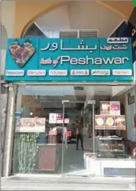  ??  ?? The entrance of Taste of Peshawar Restaurant at Salwa Road