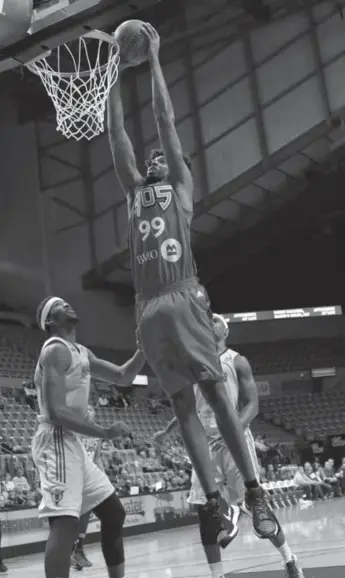  ?? RON HOSKINS/RON HOSKINS/NBAE VIA GETTY IMAGE ?? Lucas Nogueira of the Raptors 905 dunks against the Fort Wayne Mad Ants during their D-League game Sunday.