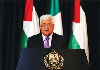  ??  ?? PALESTINIA­N AUTHORITY President Mahmoud Abbas speaks at a meeting last year.