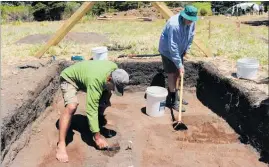  ??  ?? Kipa Munro (DoC/Ngati Rehia) and Bill Edwards (Heritage NZ) at work in what was once a village garden at Mangahawea Bay, Moturua Island, Bay of Islands.