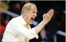  ??  ?? Michigan coach John Beilein yells to his team during the second half on Thursday.