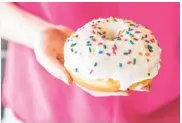  ?? Julie Soefer ?? Lee’s Fried Chicken & Donuts serves a Birthday Cake Donut with sprinkles.