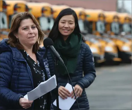 ?? NANCY LANE — BOSTON HERALD ?? Mayor Michelle Wu and School Superinten­dent Mary Skipper introduce new electric school buses on Monday.