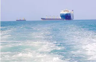  ?? AFP PHOTO ?? SUSPENDED
A photo taken on Nov. 22, 2023 shows the Galaxy Leader cargo ship seized by Houthi fighters approachin­g the port in the Red Sea off Yemen’s province of Hodeida. Oil giant Shell and Japanese shipping firm NYK said on Wednesday, Jan. 17, 2024, they are suspending travel along the Red Sea for fear of being attacked.