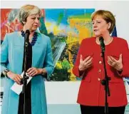  ?? APA (2) ?? Merkel drängt May beim Treffen in Berlin zu mehr Tempo bei Brexit-Verhandlun­g