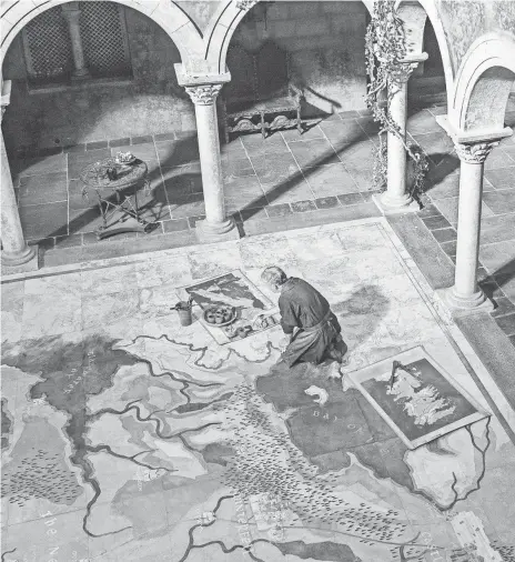  ?? PHOTOS BY HBO ?? That’s a lot of ground to cover. A map of the very large Westeros is painted in the Red Keep in King ’s Landing in Game of Thrones.
