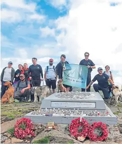  ??  ?? The Hills and Minds group after bagging another summit.