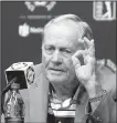  ?? AP/JAY LaPRETE ?? Jack Nicklaus shows how many golf tournament­s he and other major players from his era withdrew from with injuries during their careers. “Never entered if I wasn’t going to play,” he said.