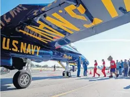  ?? SUSAN STOCKER/SUN SENTINEL PHOTOS ?? The U.S. Navy Blue Angels arrive at Executive Airport for a planning meeting with Fort Lauderdale Air Show and city officials