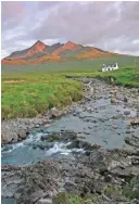  ??  ?? This undated photo provided by Visit Scotland/Scottish Viewpoint, shows Allt Dearg cottage, a unique old shepherd’s cottage which is in an isolated position under the Black Cuillin ridge on the Isle of Skye off the west coast of Scotland.