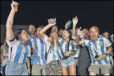  ?? AFP ?? Argentine fans wait for the arrival of their team outside the base camp in Doha.