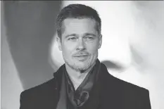  ?? VIANNEY LE CAER/INVISION/THE ASSOCIATED PRESS ?? Brad Pitt is back in the public eye following his split with Angelina Jolie last year.