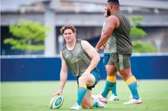  ?? — AFP file photo ?? Australia captain Michael Hooper waits to pass the ball during the captain’s run.
