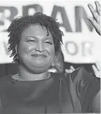  ?? JESSICA MCGOWAN/GETTY IMAGES ?? Democratic gubernator­ial nominee Stacey Abrams would become the first African-American female governor in the nation if elected over Brian Kemp.