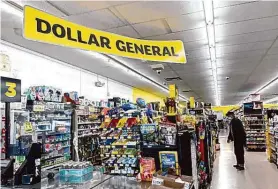  ?? Justin Sullivan/Getty Images ?? A lawsuit filed by a former assistant manager at a Dollar General store in Kern County accused the company of violating state wage and hour rules.