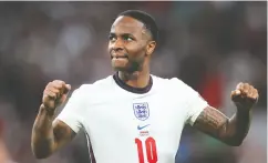  ?? CARL RECINE / POOL / AFP VIA GETTY IMAGES ?? England’s Raheem Sterling greets the fans after their win in the Euro 2020 semi-final on Wednesday.