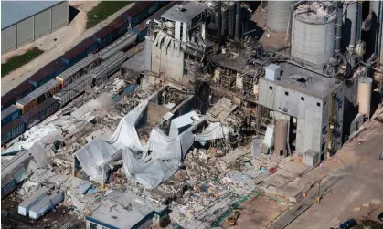  ?? Photograph: John Hart/AP ?? Part of the Didion Milling plant in Cambria after the explosion in 2017. For Dallas Oosterhof and his family things will never be the same.