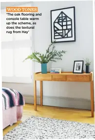  ?? ?? WOOD TONES ‘The oak flooring and console table warm up the scheme, as does the textural rug from Hay’