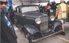  ?? PHOTO: BLOOMBERG ?? Attendees view a vintage Ford Motor vehicle during the company's centennial celebratio­n of the Rouge manufactur­ing complex in Dearborn, Michigan, US, last month