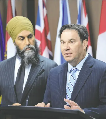  ?? SEAN KILPATRICK / THE CANADIAN PRESS FILES ?? NDP MP Don Davies, right, and NDP Leader Jagmeet Singh. The NDP’S motion on Canadian policy toward the Israel-hamas war, which will be up for a vote in the House of Commons on Monday, is a seismic shift that threatens to upend 50 years of Canadian foreign policy, Joe Roberts says.