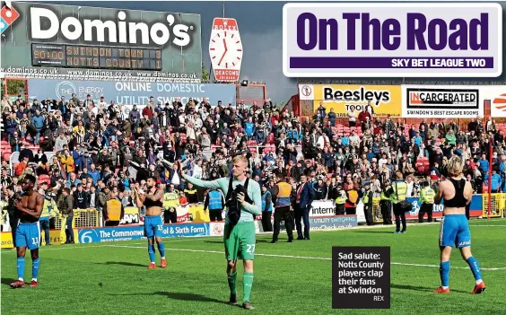  ?? REX ?? Sad salute: Notts County players clap their fans at Swindon