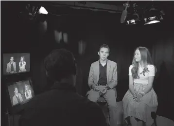  ?? Tribune News Service ?? ■ David and Lauren Hogg, authors of #NeverAgain, discuss their experience­s following the shooting at Marjory Stoneman Douglas High School during an interview in New York. Fourteen students and three staff members were fatally shot and multiple others...