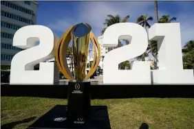  ?? LYNNE SLADKY — THE ASSOCIATED PRESS ?? The trophy for the College Football Playoff championsh­ip in January in Miami Beach, Fla.