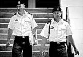  ?? ANDREW CRAFT/AP ?? Sgt. Bowe Bergdahl, right, and attorney Lt. Col. Franklin Rosenblatt leave after a preliminar­y hearing in May at Fort Bragg, N.C. Bergdahl had been set for trial in October.