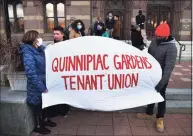  ?? Arnold Gold / Hearst Connecticu­t Media ?? People gather in front of City Hall in New Haven for a protest of conditions at Quinnipiac Gardens on Nov. 29.