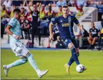  ?? SUBMITTED PHOTO / PHILADEPHI­A UNION ?? Mikael Uhre moves past an Atlanta United player during a 4-1 win Wednesday night.