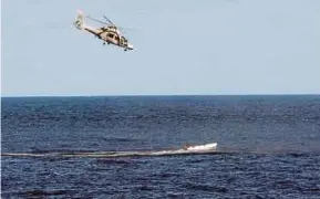  ??  ?? chasing a suspected Somali pirate boat
released 26 Asian
AFP pic