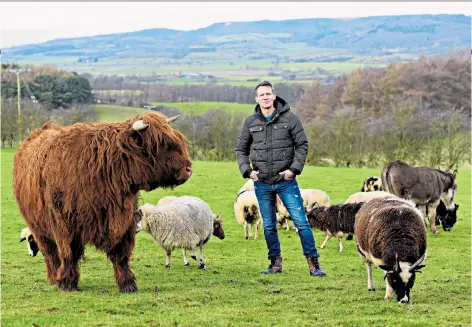  ??  ?? A big commitment: Morland Sanders on a farm near his North Yorkshire home, above, and the year’s ‘hottest vegan’, Cath Kendall, with a furry friend, below