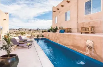  ?? Photog raphs by Clark Dugger ?? ERIC BURDON, a British Invasion singer who sang with the Animals and then the funk band War, has listed his retreat in Joshua Tree for sale at $999,000. The home’s outdoor amenities include a lap pool.